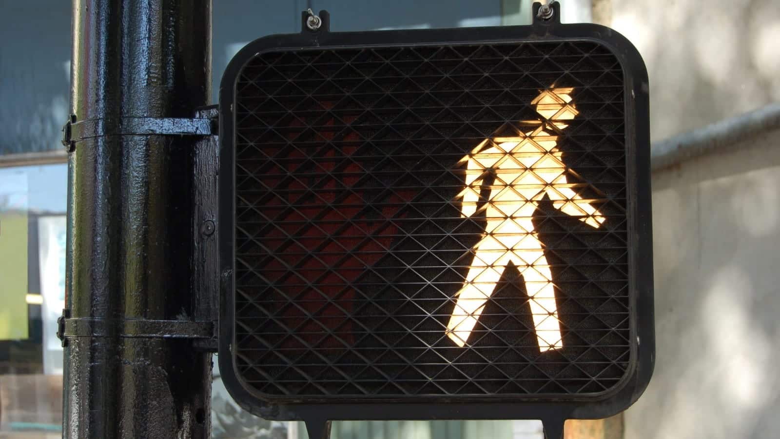 Walk At The Crosswalk Sign